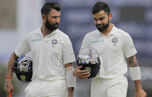 pujara and kohli image