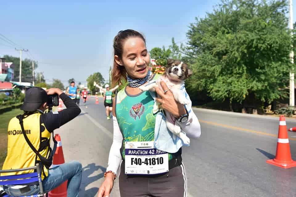 Marathon Runner Khemjira With Puppy