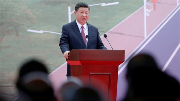 xi jinping says taiwan  must and will be  reunited with china