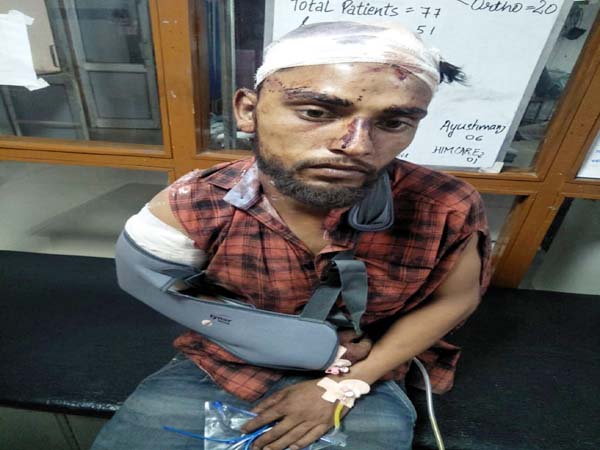 PunjabKesari, Injured Bike Rider Image